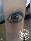 Eye Tat Design On Leg